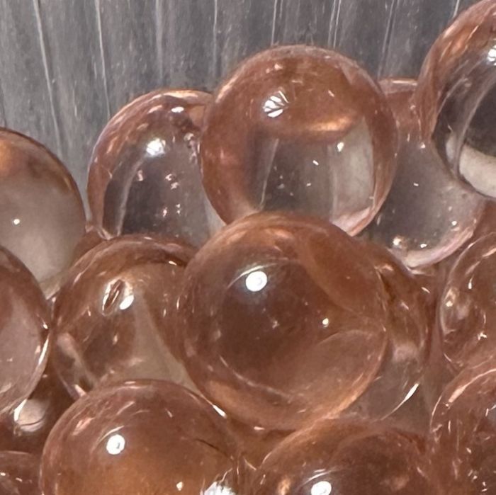 Rose 10mm : petite bille en verre rose saumon translucide