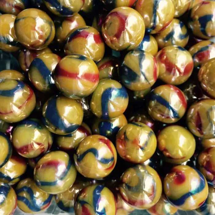 Grosse Bille Perroquet 35 mm : Plus vibrante qu'un perroquet en parade